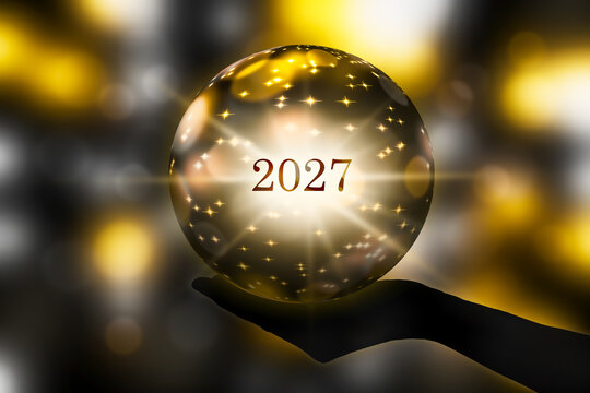 fortunetelling 2027 with a crystal ball in a hand, festive atmosphere for happy new year party or award ceremony or other celebrations, 3d illustration
