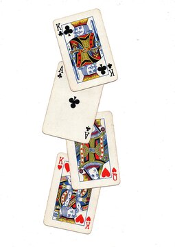 A hand of vintage playing cards isolated on a white background.