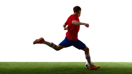 Fast teenage footballer accelerating into open field with ball. Concept of speed training, counterattack, athletic endurance and competitive match play. © master1305