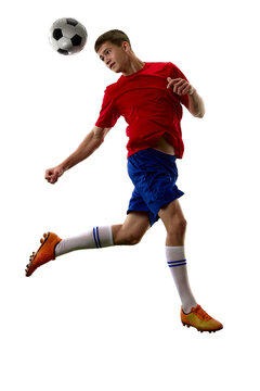 Jumping teenager soccer player redirecting ball with precise header. Concept of set piece play, aerial finishing, timing and offensive football technique.