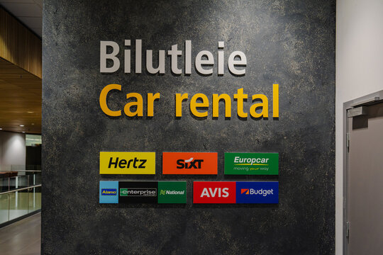 August 15, 2026, Stavanger, Norway - Car rental sign with logos of Hertz, Sixt, Europcar, Alamo, Enterprise, National, Avis, and Budget at Stavanger Airport