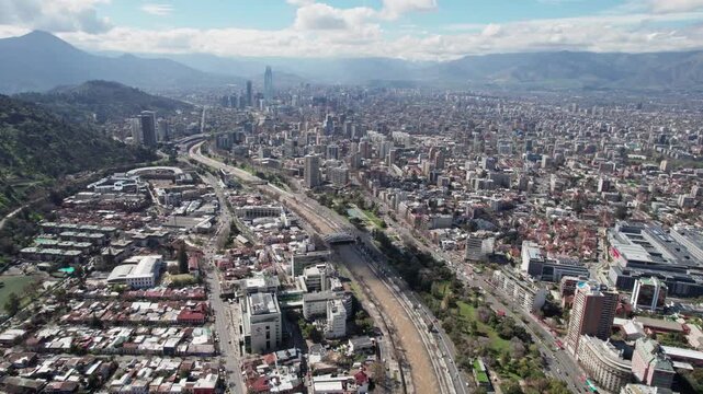 Drone View Of Santiago de Chile, Mapocho River And Andes Mountains In Daytime