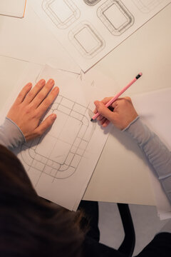 Woman designing a new product for her brand