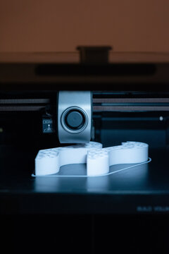3D Printer Creating a Model in a Workshop
