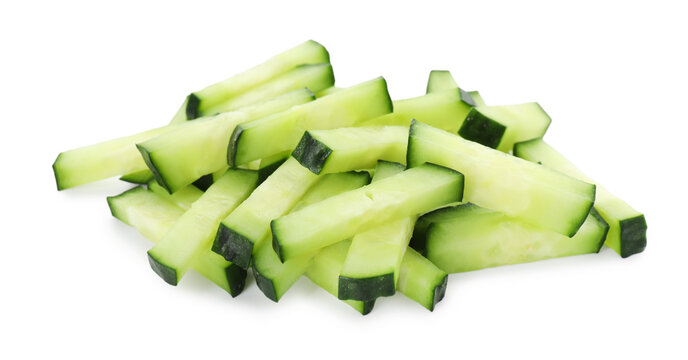 Pieces of fresh ripe cucumbers isolated on white