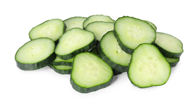 Pieces of fresh cucumbers isolated on white