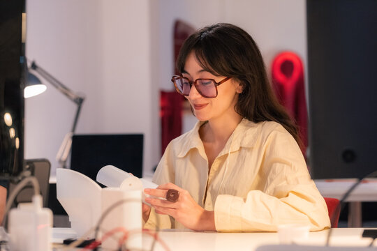 Woman working at product design studio