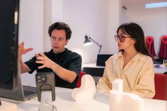 Designer working with engineer at studio
