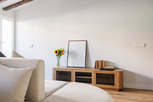 Sideboard with sunflowers and frame