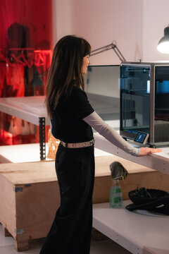 Happy woman using 3d printing technology