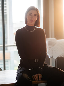 Woman posing in sunlight