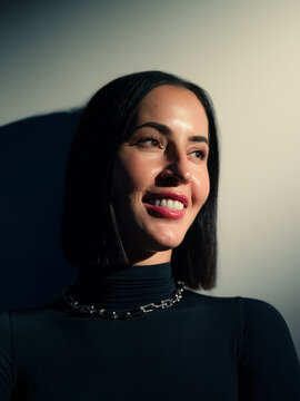 Smiling woman studio portrait