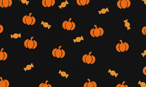 Seamless pattern with orange pumpkins and candies on a black background for halloween celebration