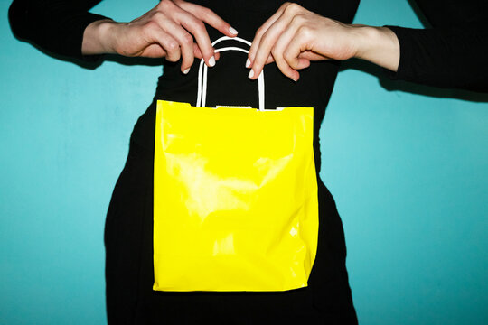 Yellow color mockup takeaway bag with empty space for text or design