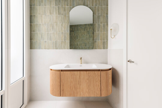Curved wooden bathroom vanity design