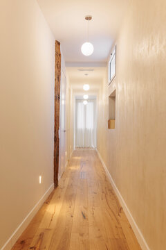 Hallway perspective with timber beam