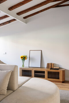 Wooden credenza with picture frame