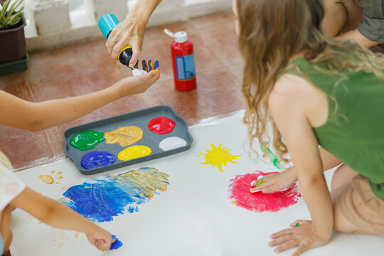 Shaving foam and tempera paints for sensory activities