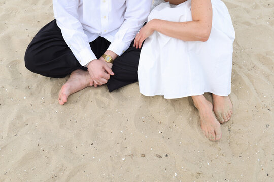 a couple on the riverbank
