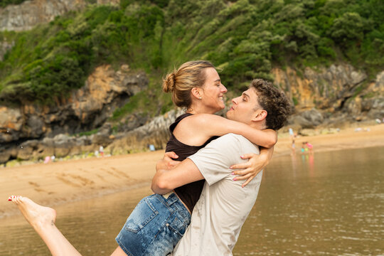 Couple Enjoying Each Other's Company at the Beach in Summer