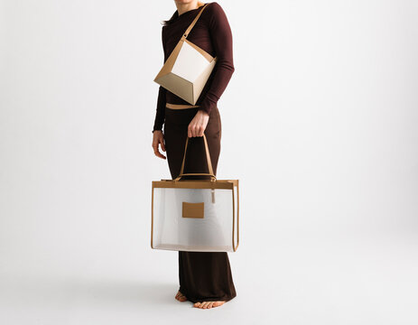 Minimal Fashion Model With Handbag And Tote