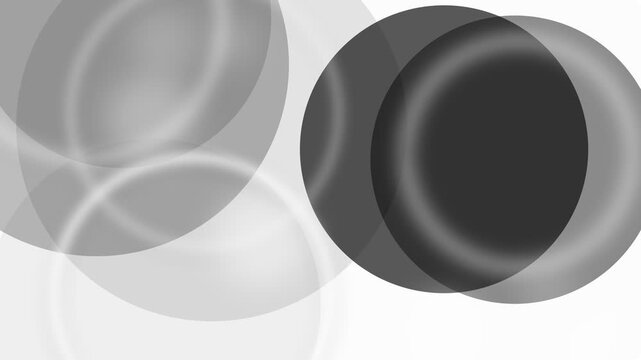 Abstract composition of overlapping translucent circles in grayscale tones
