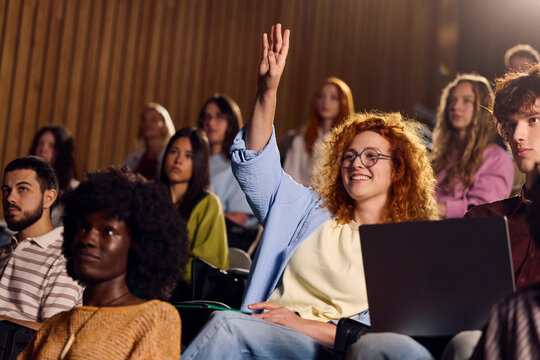 Student asks a question during a lecture.