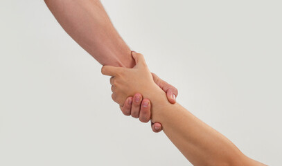 Partnership starts with strong handshake. Partnership creates agreement and success. Helping hands show partnership support. Closeup grip defines partnership concept.