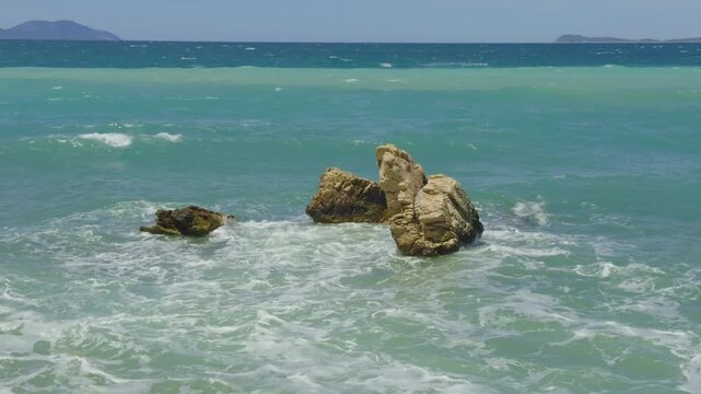Sea Waves Crashing On Coastal Rocks In Turquoise Water. Mediterranean Coastline 