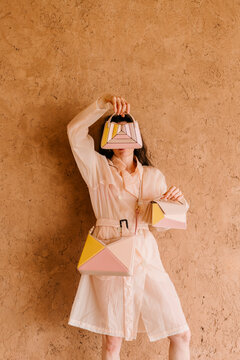 Pastel Geometric Handbags Styled With Trench Coat