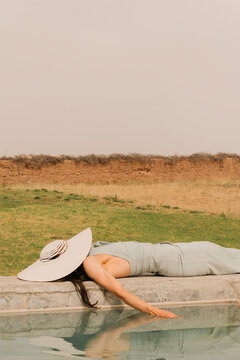 Relaxing By Pool in Wide Brim Sunhat