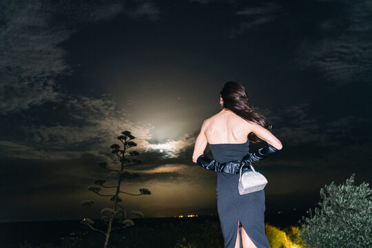Elegant Nighttime Silhouette in Black Dress