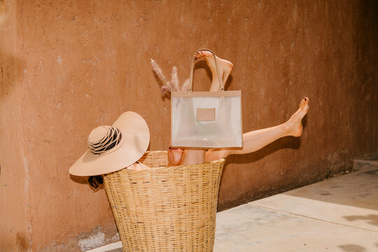 Playful Summer Fashion In Wicker Basket