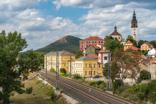 Litomerice, Usti nad Labem Region, Czechia - 06 August 2026: View of the historic city centre of Litomerice featuring cathedral of St. Stephen and Radobyl hilltop