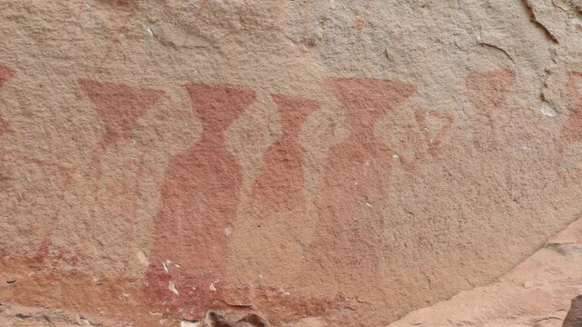 Ancient prehistoric cliff rock painting at Pha Taem National Park, Ubon Ratchathani, Thailand.