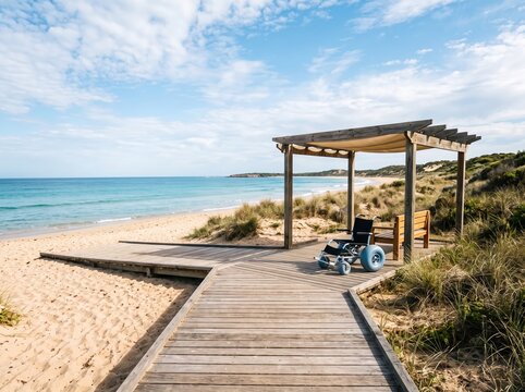 Beach wheelchair parked under wooden pergola on boardwalk