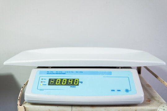 Empty digital pediatric scale for weighing babies in medical clinic