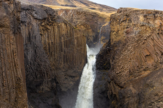 Litlanesfoss waterfall canyon with hexagonal basalt columns Iceland