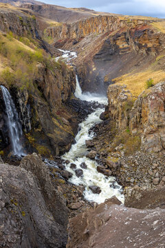 Litlanesfoss waterfall in Hengifossa river canyon canyon Iceland