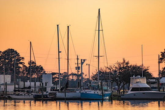 Boats Are Docked in the Harbor at Gulf Shores Alabama During Sunset