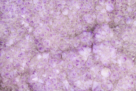 White and violet Amethyst Cactus Quarz stone closeup