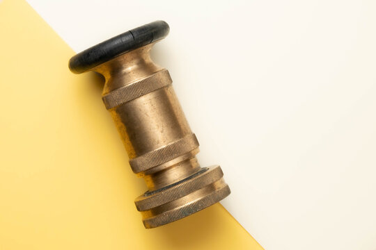 Heavy-duty, industrial brass fire hose nozzle with adjustable stream and fog functions