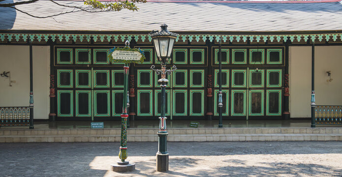 Vintage Street Lantern and Ornate Traditional Pavilion at Kraton Yogyakarta Royal Palace in Java Indonesia