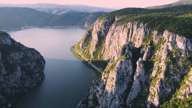 Aerial view flying over the Danube river gorge Iron Gates, nestled between the Carpathian Mountains of Romania and Serbia in Djerdap National Park
