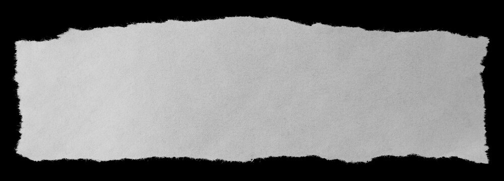 Torn paper on black