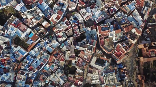 Aerial view of the historic blue buildings and terracotta rooftops in the old town of Chefchaouen, Tangier-Tetouan-Al Ho, Morocco.
