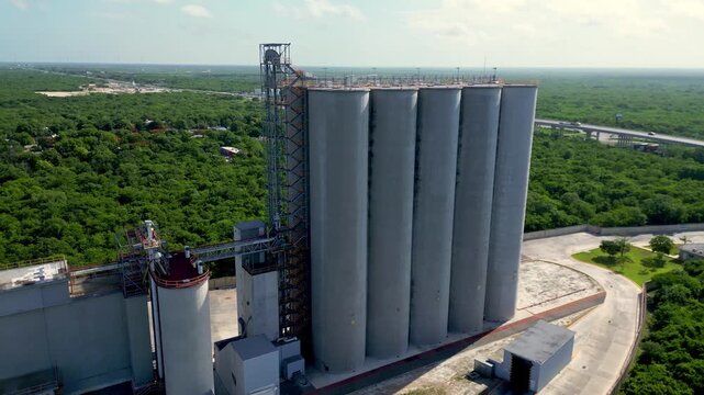 Aerial view of industrial grain silos and processing plant