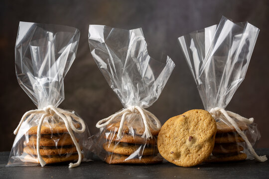 Bags of chocolate chip cookies in a plastic bag with a bow