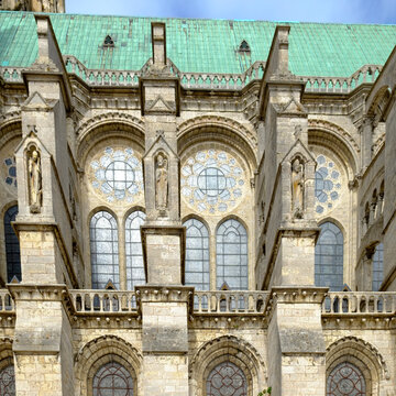 Gothic cathedral facade with rose window and lancet windows
