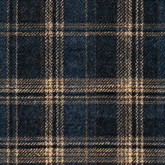 Fototapeta premium Seamless pattern woven wool textile showing a classic tartan check pattern in navy blue and beige. Repeating fabric texture with traditional design